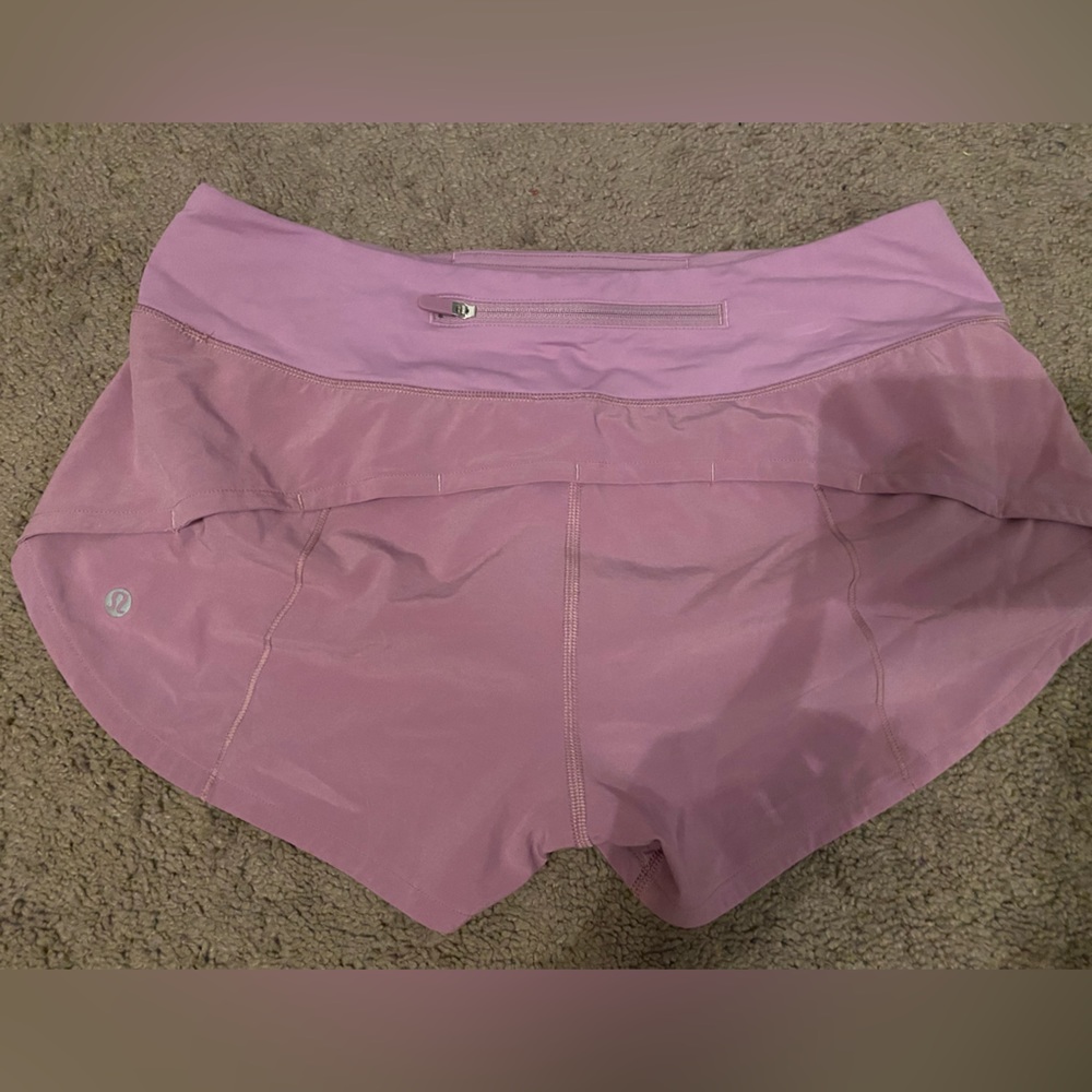 Rosie pink purple color lightly worn  lululemons size 6 reg